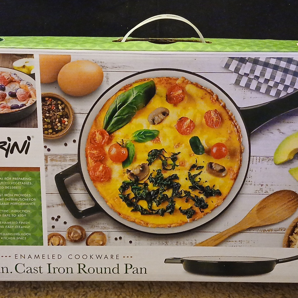 Brand new cast iron round pan 9"   in box